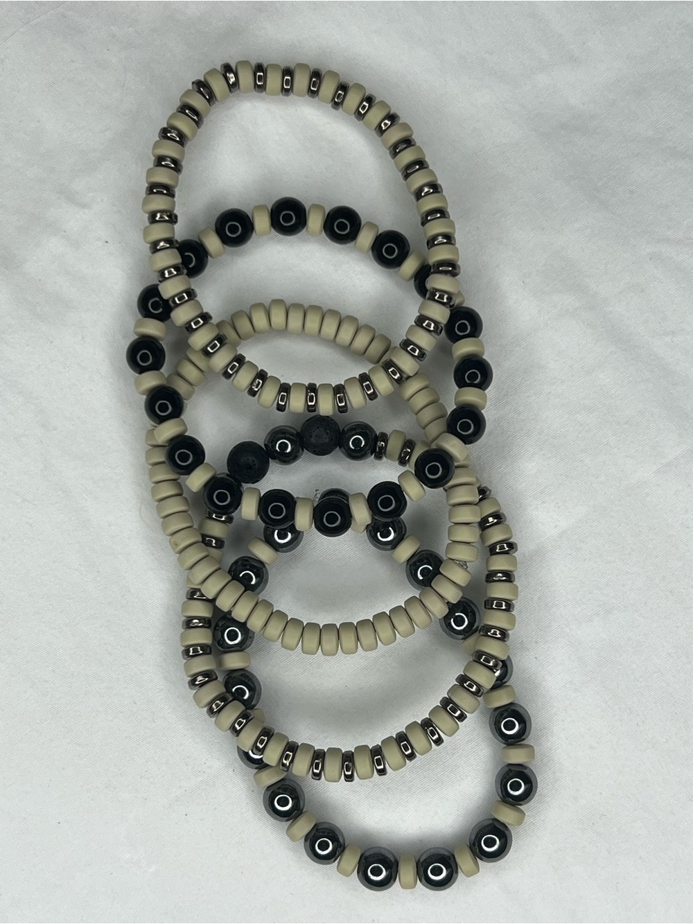 3pcs Stretch clay Bracelet Set in Beige and Black zinc and lava rocks